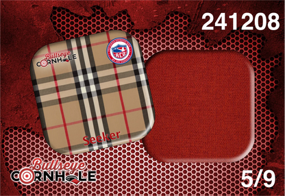 Plaid Fabric design on Seeker bag with Red slow side